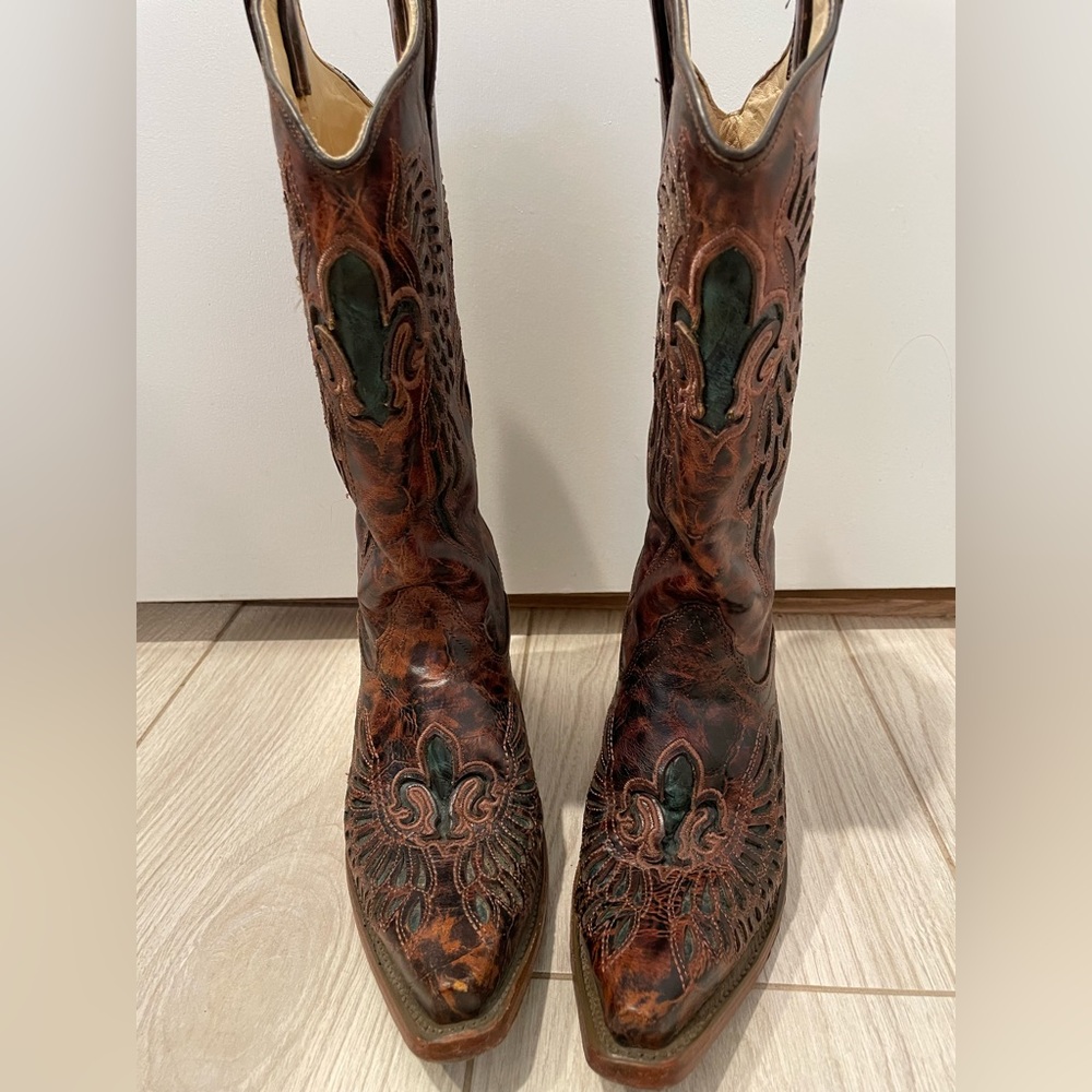 Cowgirl boots, wore twice.